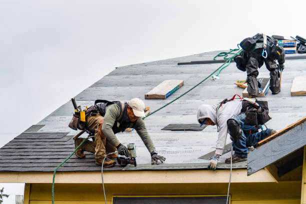 Professional Gutter Installation technician working in Maynard, MA